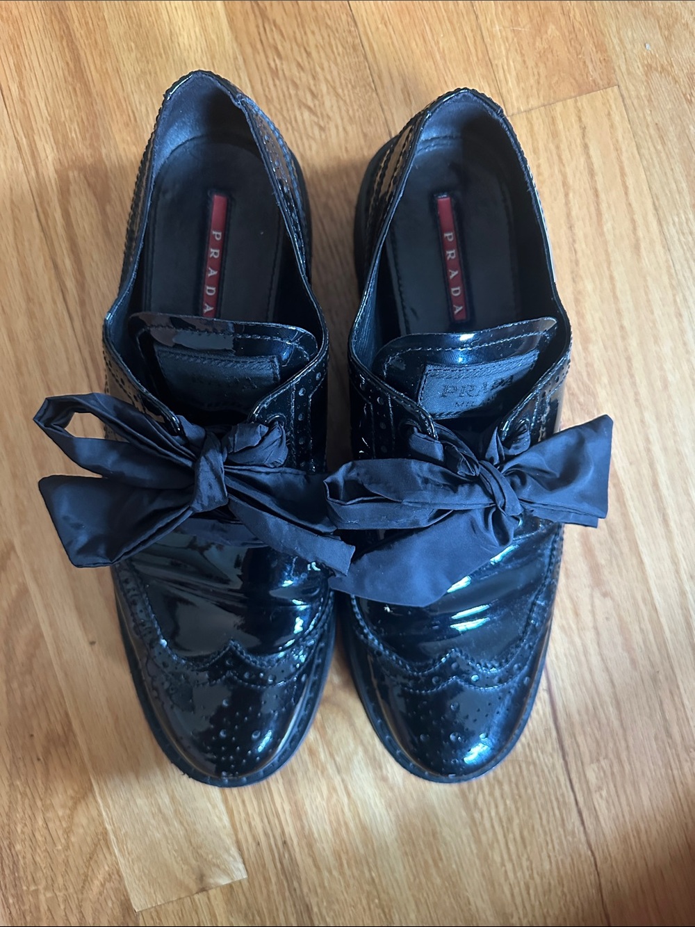 Prada Black Patent Leather Brogue Loafers with Fabric Bow